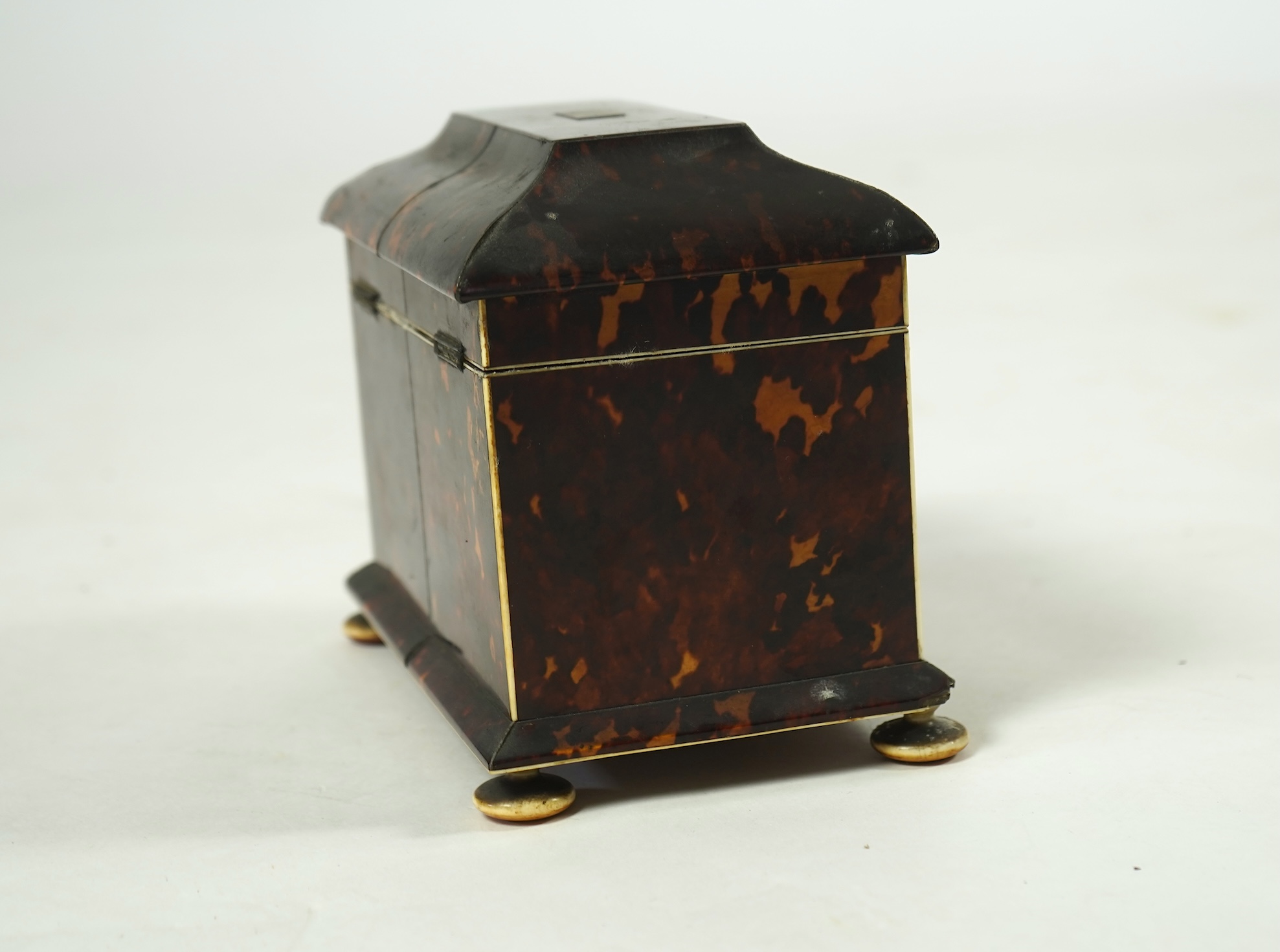 An early Victorian tortoiseshell tea caddy